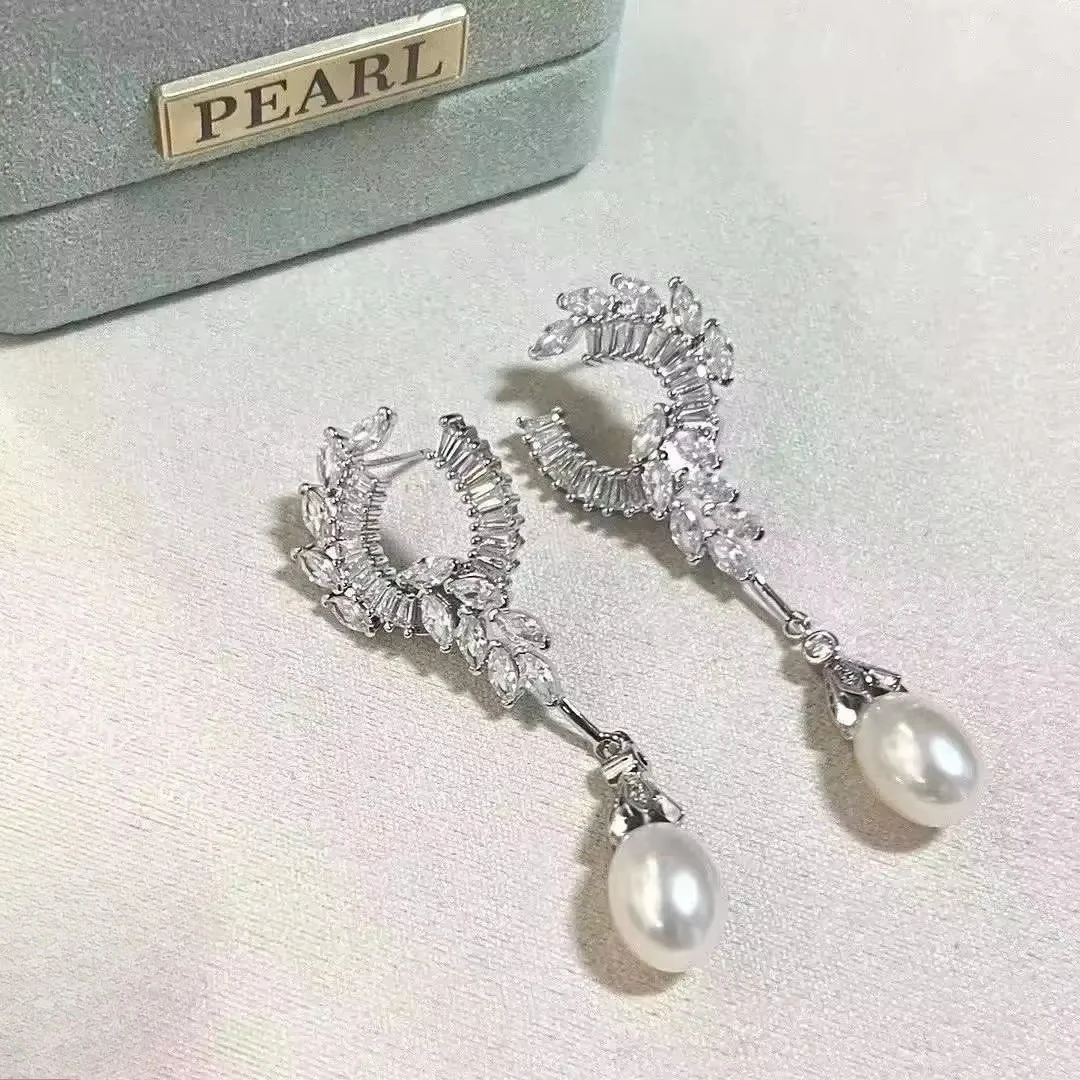 

Princess Pearl Earrings 9-10mm Natural Freshwater Pearls with Silver Plated Angel Wings 925 Sterling Silver Pin