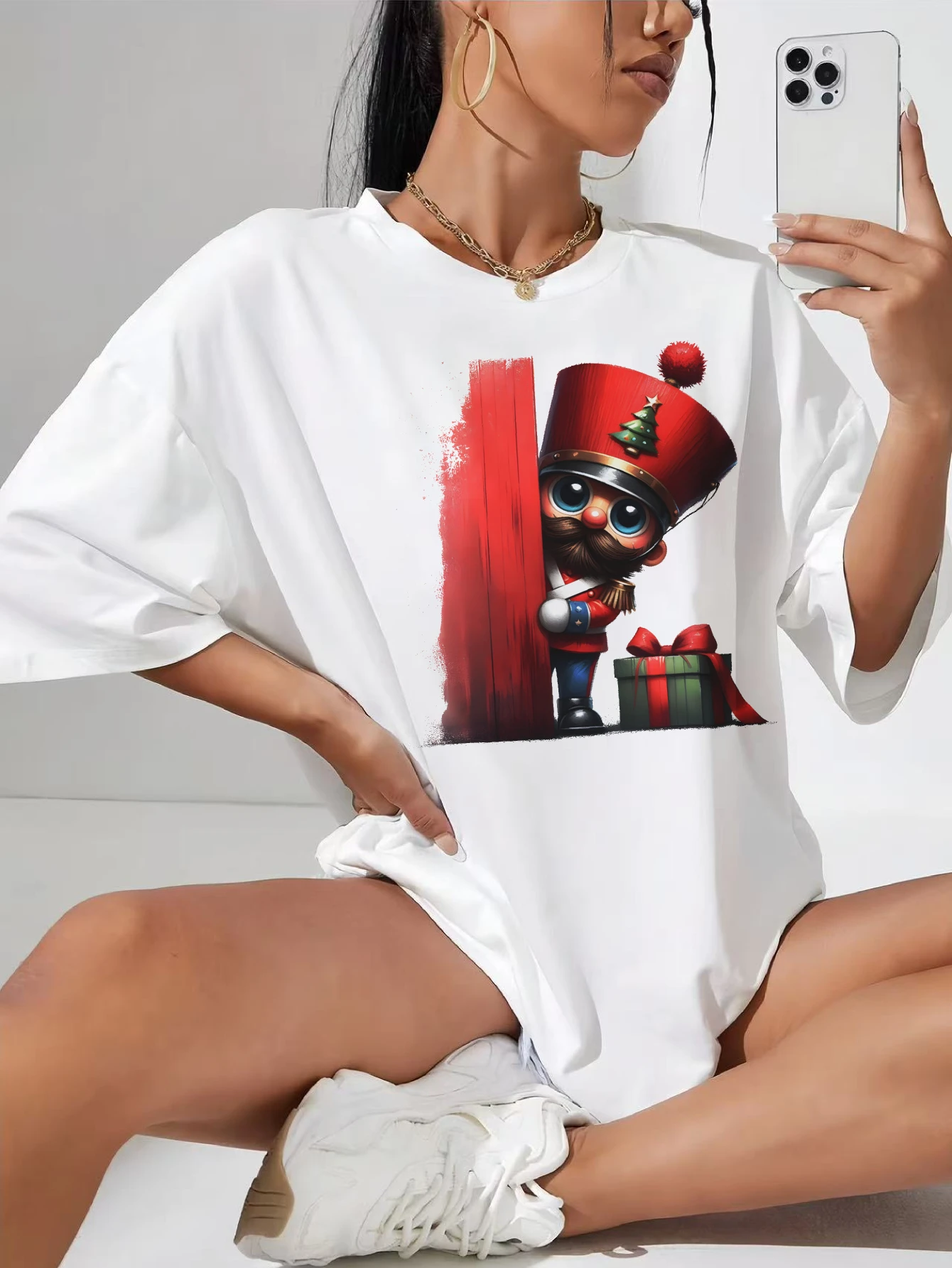 

Christmas Characters peeking around Plus Size Women's White Cotton T-Shirt Perfect for Christmas and Pregnancy Cozy Comfortable