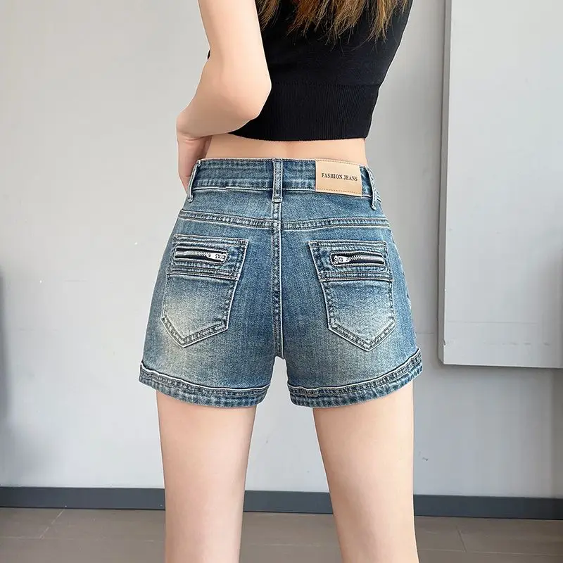 Nuovi pantaloncini di jeans da donna ultra corti a vita alta elasticizzati skinny a trapezio che allungano le gambe