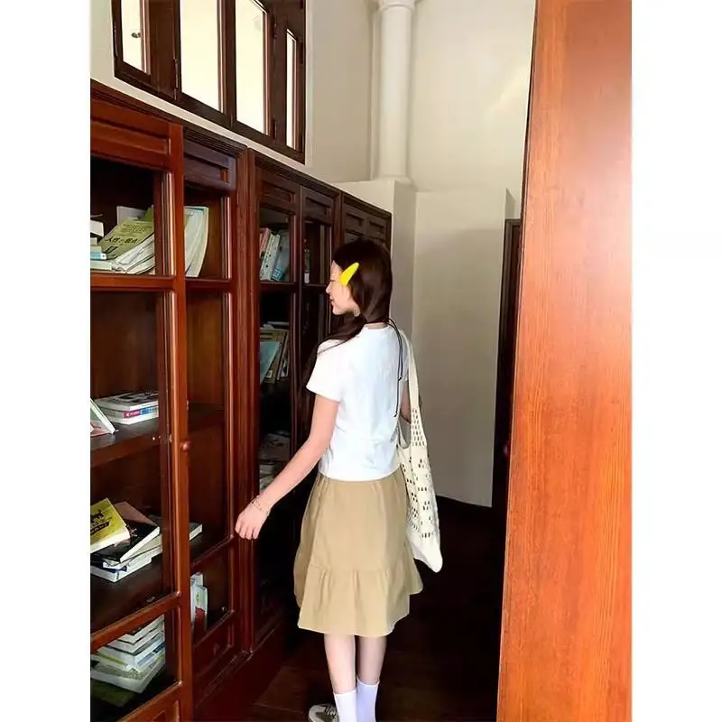 กระโปรงทรงเอ สไตล์ลำลอง แฟชั่นฤดูร้อน 2025 สำหรับผู้หญิง สีกากี ผ้าโพลีเอสเตอร์ สีพื้น คอลเลคชั่นฤดูใบไม้ผลิ