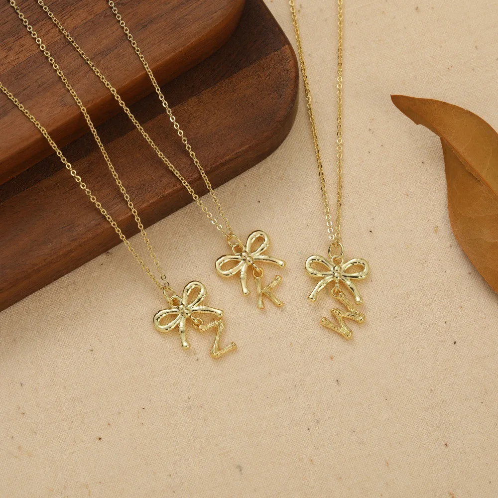 New hot-selling retro personalized bow gold 26 capital English letters pendant necklace
