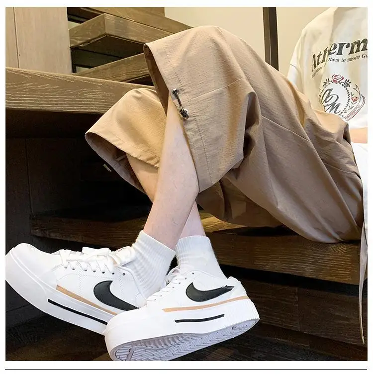 男性夏のハイストリートベルトカジュアルルーズソリッドカラー多用途ポケットスプライシングワイドレッグパンツ