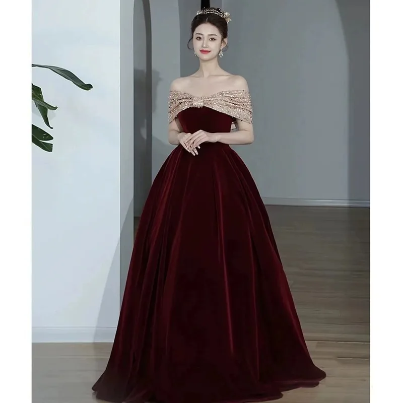 

2026 New Women's Sexy One Shoulder Wine Red Bridal Toast Dress Fashionable Slimming Banquet Spirit Piece Bow Long Dress