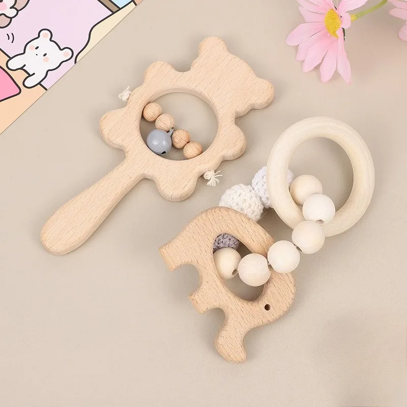 Nuovo sonaglio per bambini, giocattolo portatile, dentizione per bambini, braccialetto in legno di faggio mordibile