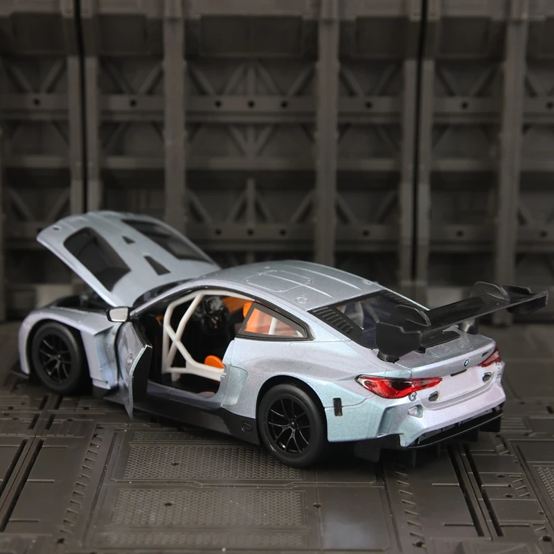 

Модель автомобиля BMW M4 GT3 из сплава, масштаб 1:24, с открывающимися дверями и капотом, рулевым управлением, функцией скольжения и аксессуарами для раллийных автомобилей.
