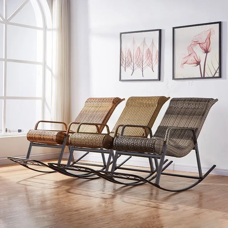 Person relaxing in the rattan rocking chair