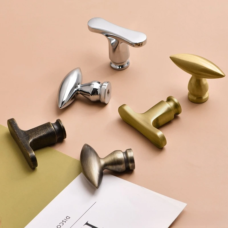 Bronze cabinet door handles with a retro style Luxurious and elegant olive-shaped single-hole bronze handles for the cabinet