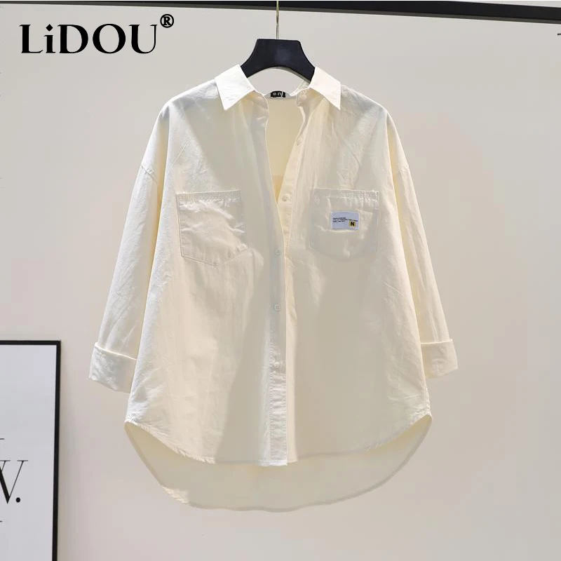 2022 Summer Fashion Casual Cotton Lapel Buttons Simple Pocket Asymmetrical Long Sleeve Basic Comfortable Shirt Blouses Women