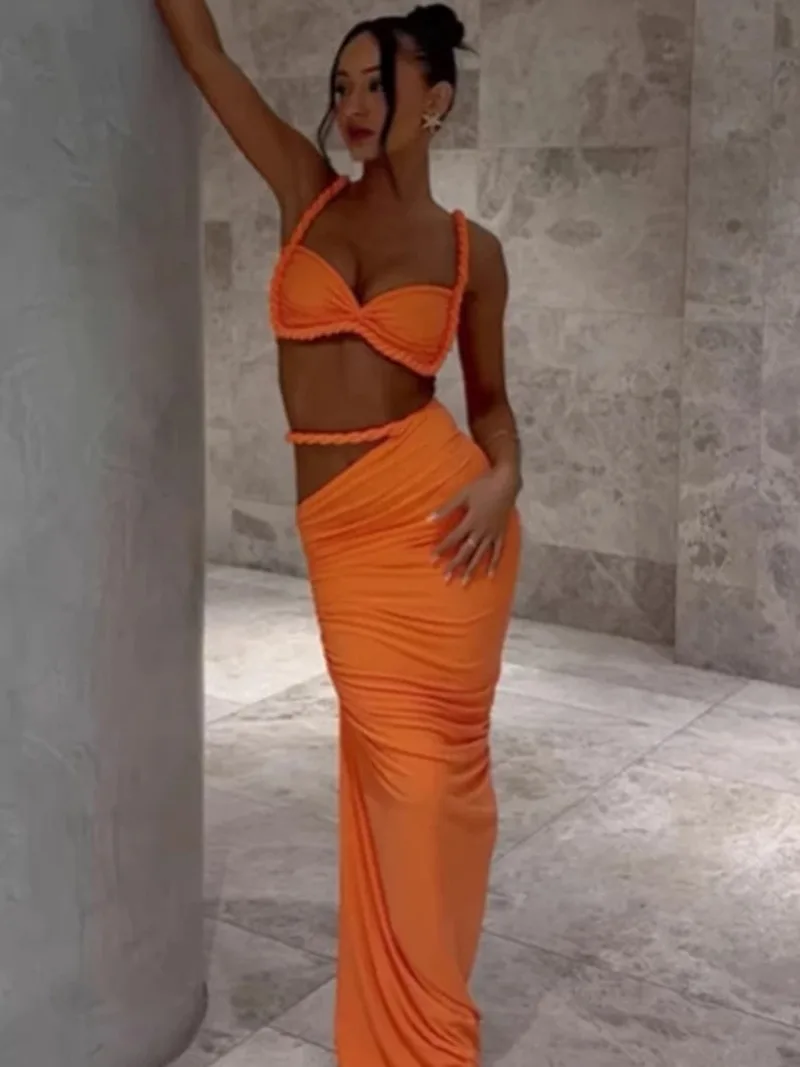 

European and American women's clothing 2025 spring new sexy solid color backless small tank top and hip hugging skirt set pink