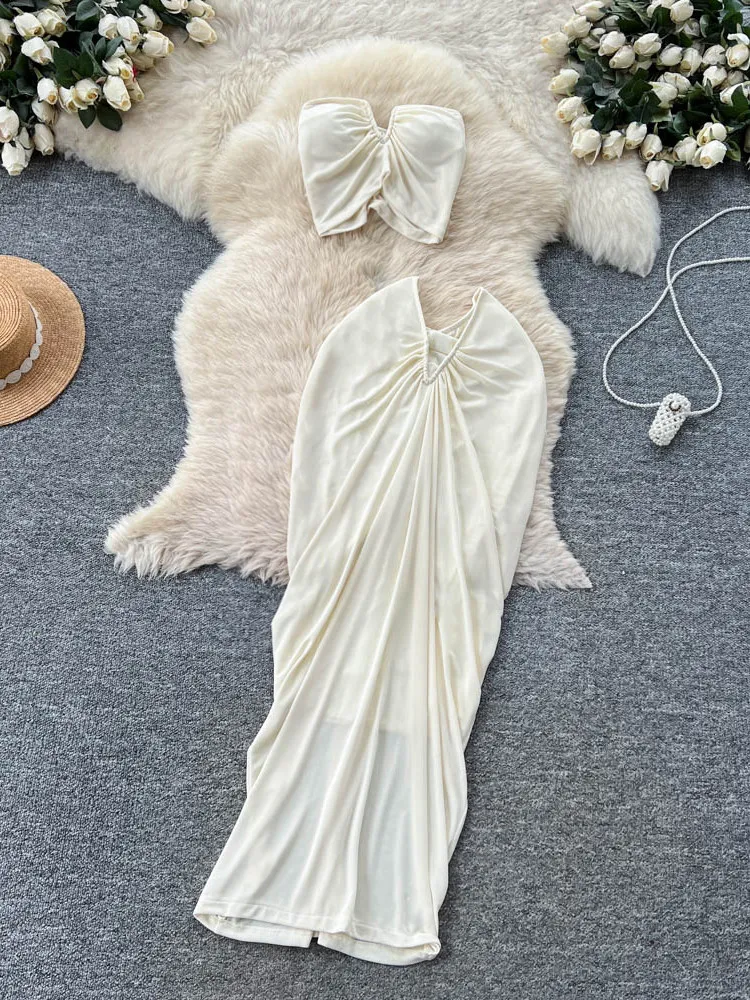 

Летний комплект из двух предметов: сексуальный топ без бретелек и элегантная юбка с высокой талией в стиле Vacation, создающий эффект стройности.