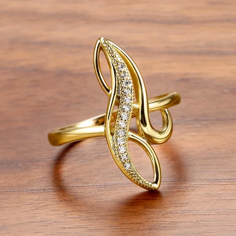 Huitan anmutige kontrahierte Stil Ring weibliche tägliche Party Schmuck Gold Farbe brillante Zirkonia Finger Accessoires für Verlobung