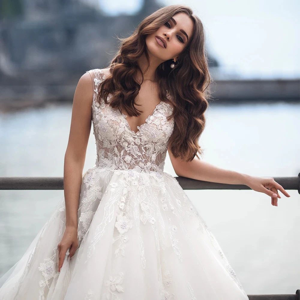 

Sexy Sleeveless A Line Wedding Dresses Romantic Deep V Neck Applique Beaded Bridal Gowns Customized Lace Bride Dress