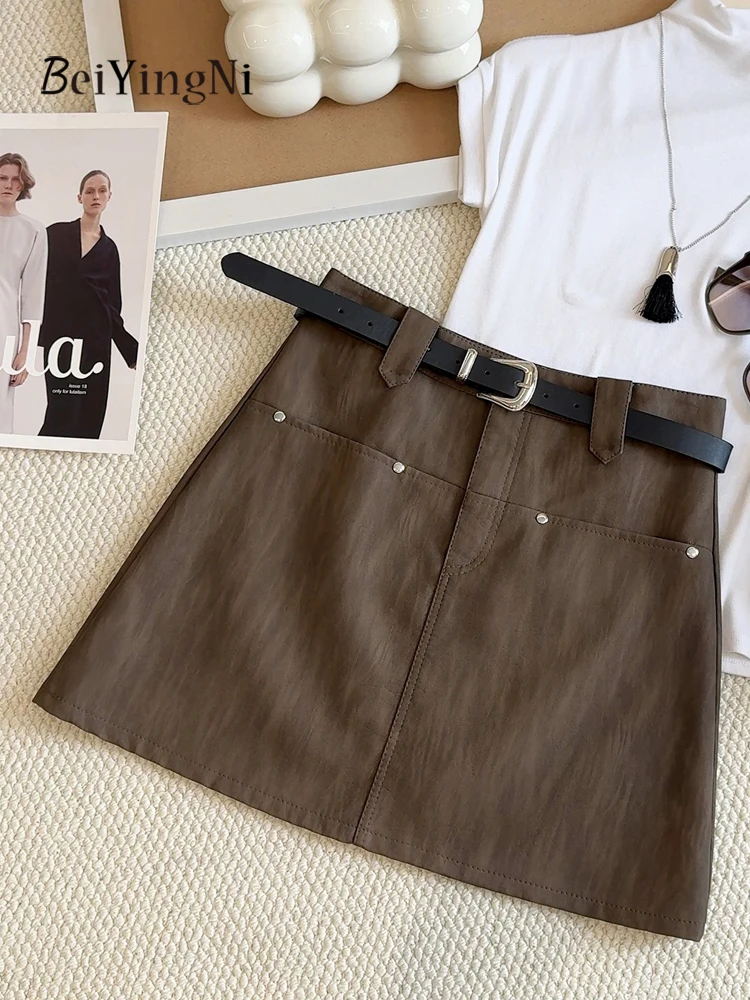 Beiyingni Vintage Spódnica w kształcie litery A z wysokim stanem, damska spódniczka mini ze skóry PU z paskiem, streetwear, z podszewką, wiosna-jesień 2025, Faldas