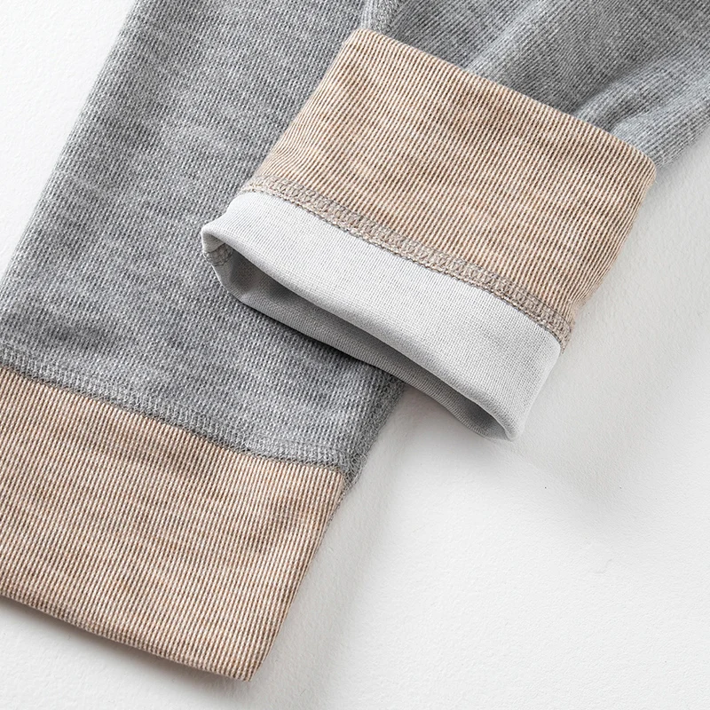 Set di biancheria intima calda da uomo in 2 pezzi autunno/inverno, moda fine pit strip, pantaloni comodi in vita elastica per giovani semplici e versatili