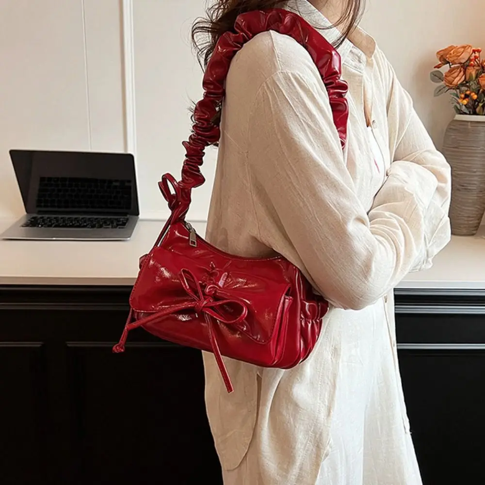 Borsa a tracolla con fiocco in stile francese Borsa in pelle PU stile coreano con coulisse pieghettata Borsa da viaggio con tracolla pieghevole in tinta unita
