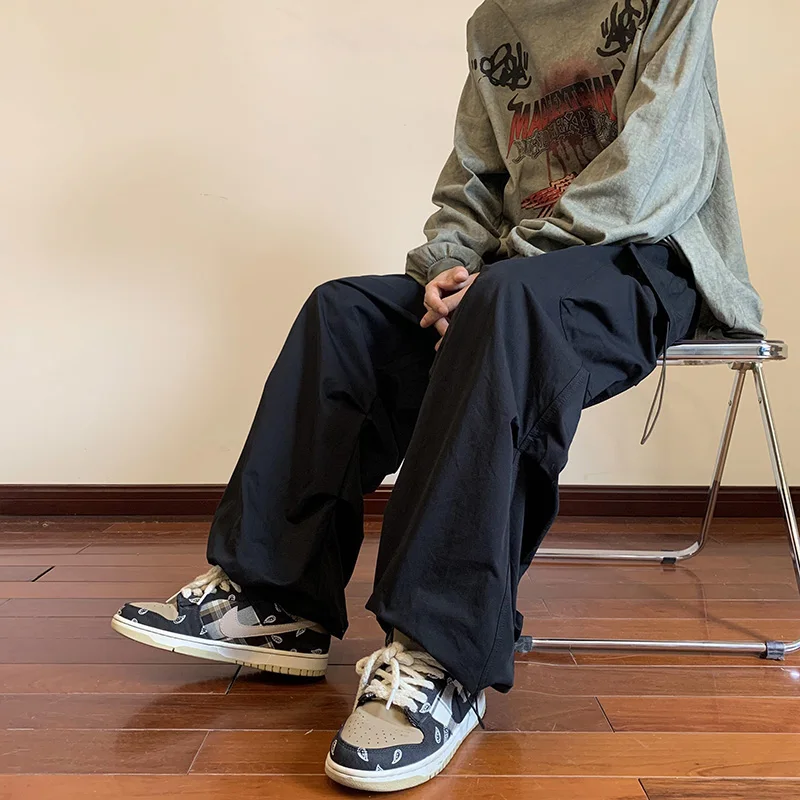 Calça de cintura elástica masculina e feminina, calça Harajuku de moda hip-hop, bolso casual, até o tornozelo, preta