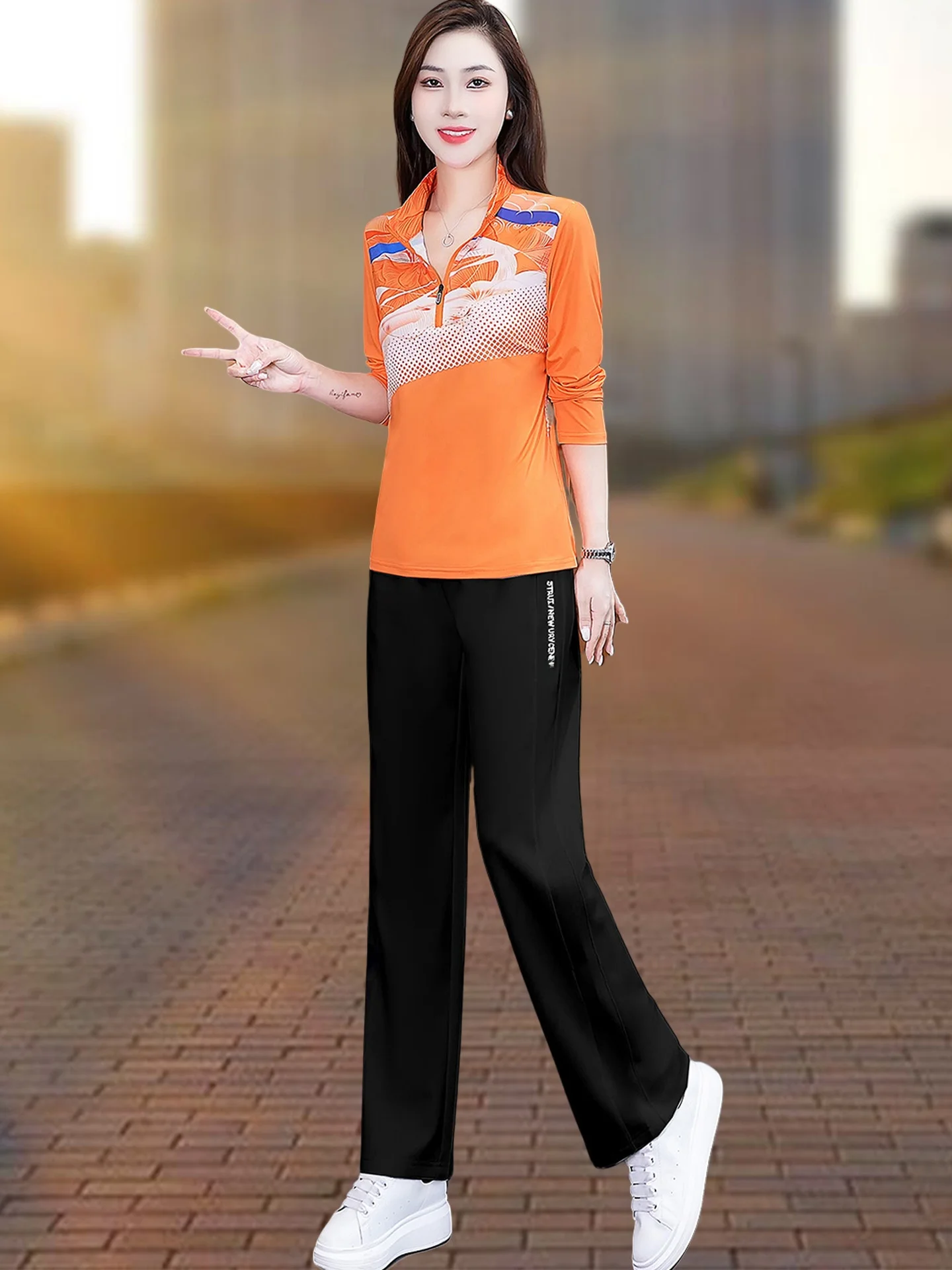 طقم ملابس رياضية من الحرير الجليدي للنساء لربيع وخريف فضفاض قابل للتنفس وياقة واقفة طويلة Sve مكونة من قطعتين كوي جاف غير رسمي...