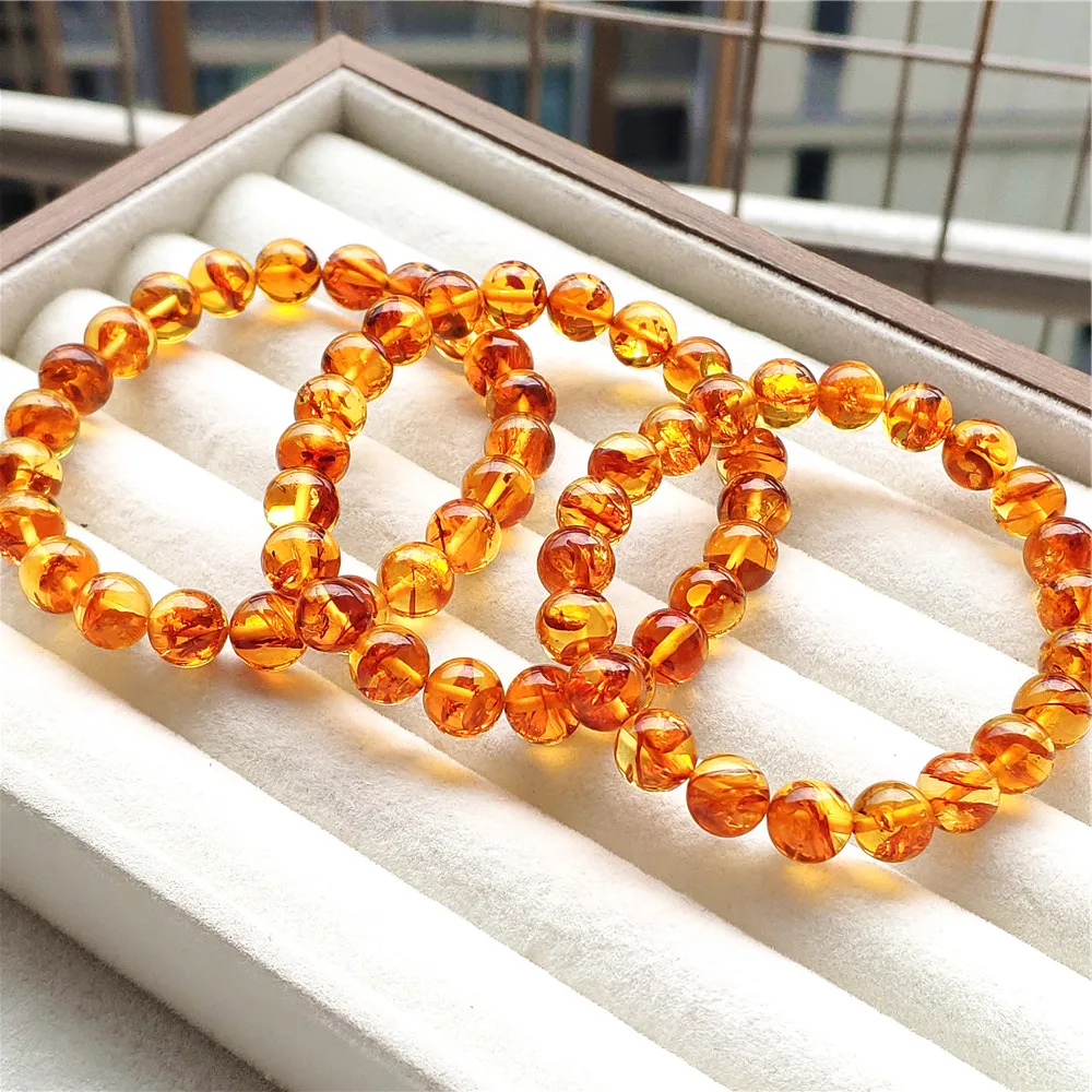 

Натуральный браслет из желтого пятнистого янтаря с круглыми бусинами 8 мм, цветочный янтарь, женский, целебный, эластичный, класс ААААА