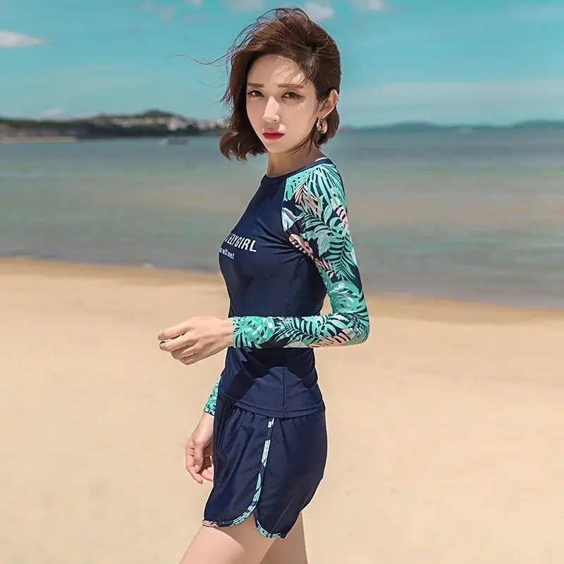 بدلة سباحة نسائية بأكمام طويلة لركوب الأمواج طقم مكون من ثلاث قطع 2024 جديد محافظ للحماية من الشمس ربيع حار للسيدات