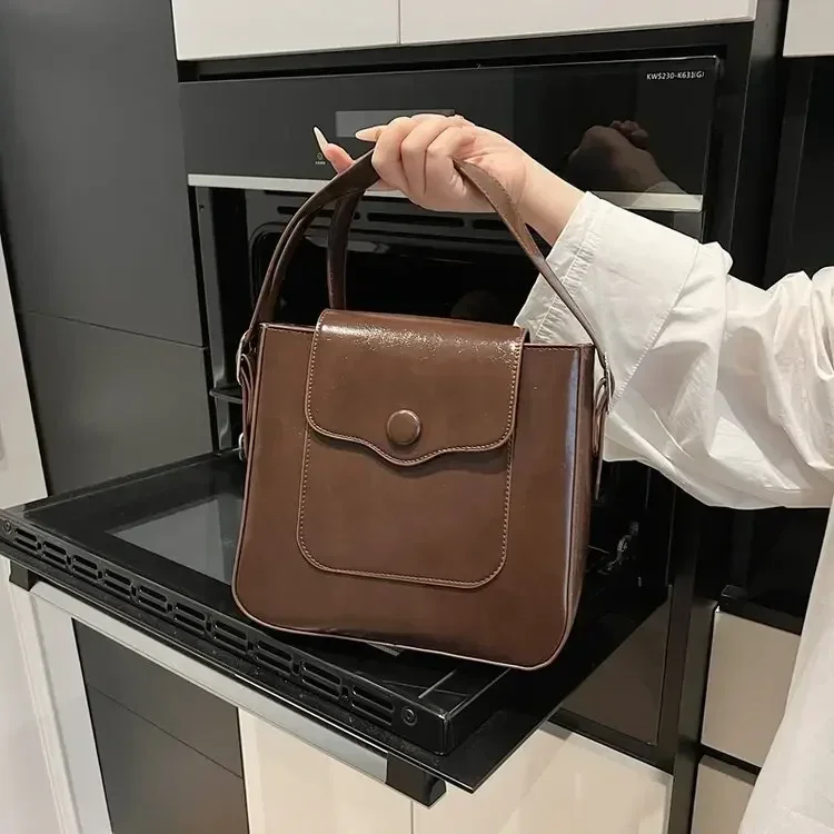 

2025 New Women's New Leather Large Capacity Tote Bag - Versatile Shoulder/Handheld Bag for Office Travel Work Essentials