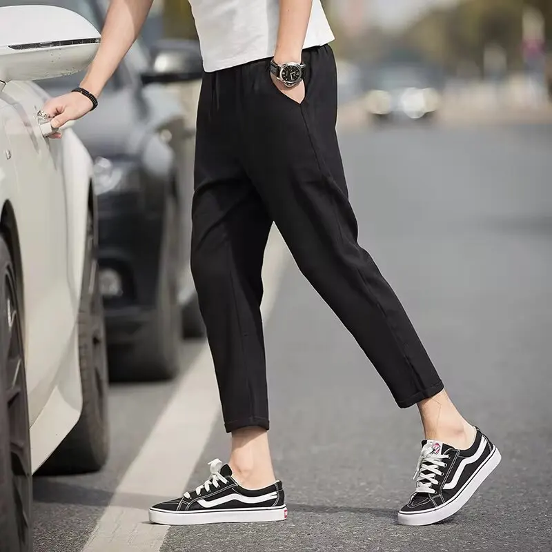 

Oversized men's sports pants, fashionable checkered casual pants, elastic waist pocket, student neutral hip-hop loose pants