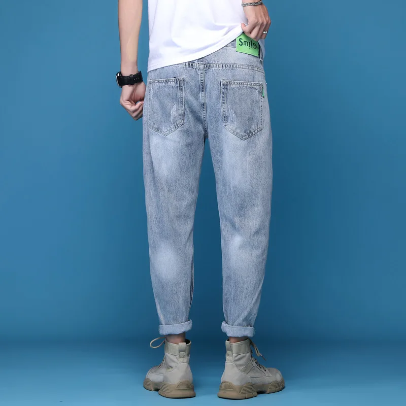 Jeans rasgado azul claro masculino, calça jeans fina, retrô, lavada, angustiada, solta, elástica, versátil, verão