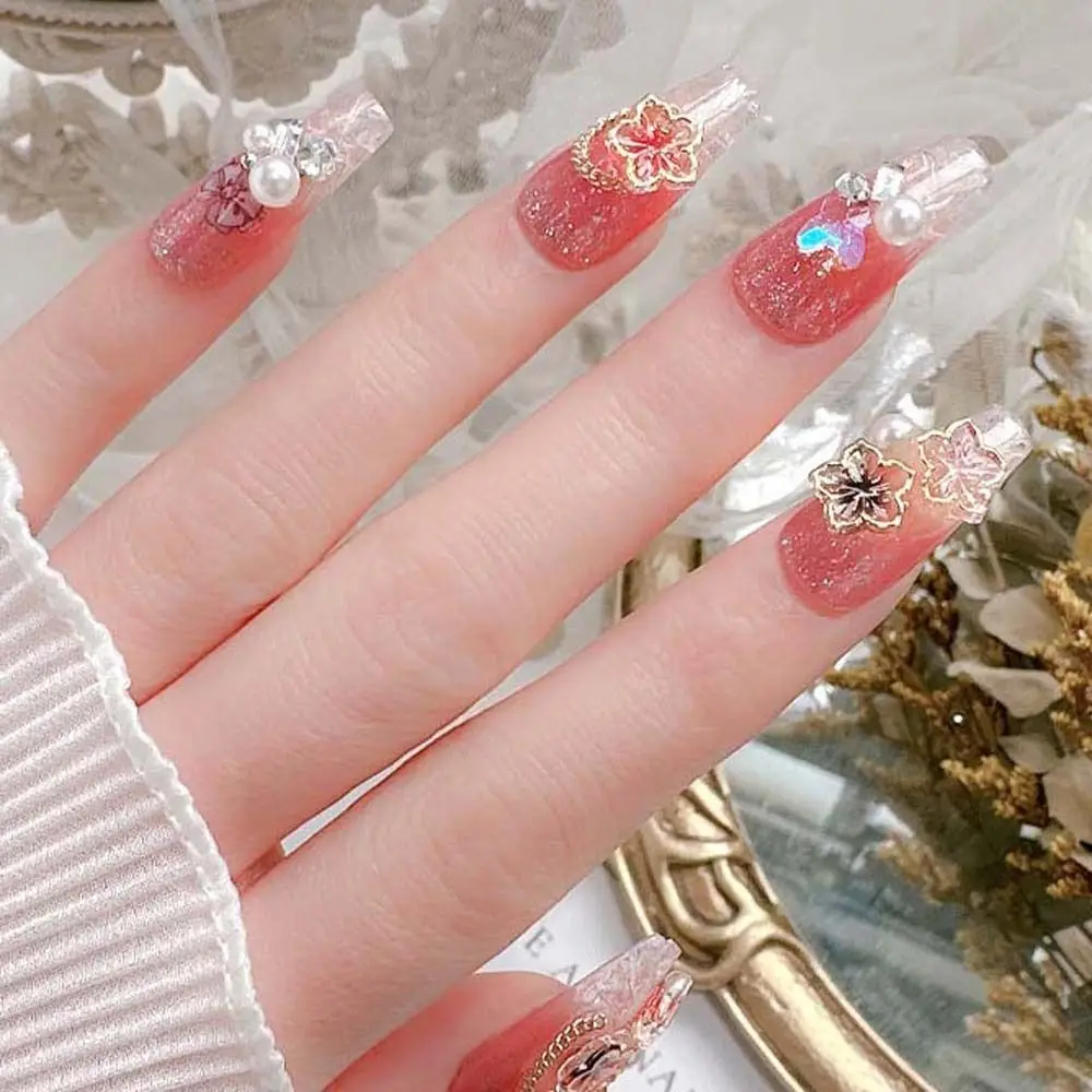 Japońskie zdobienia paznokci Bauhinia kwiaty zawieszki do paznokci akcesoria do Manicure 3D wiertła do paznokci cyrkonie do paznokci kwiaty ozdoby do paznokci