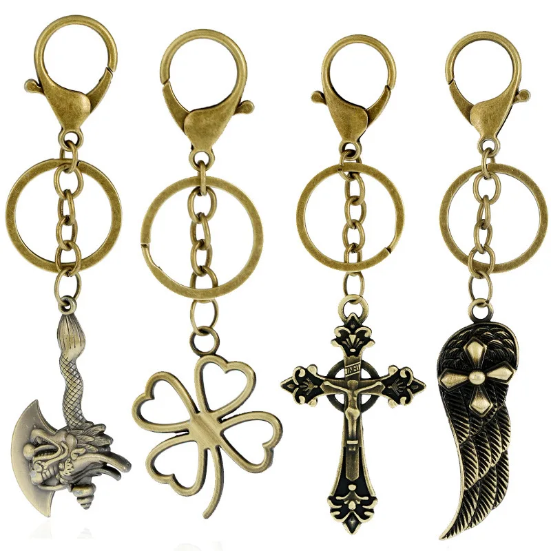 Alloy four-leaf clover fishbone wings keychain Couple car key pendant key chain personality bag key ring