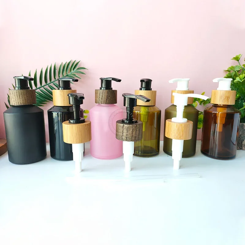 Mini garrafas portáteis de bomba de vidro fosco e transparente rosa/verde/preto/marrom/vermelho com capa de grão de bambu inclinação ombro portátil
