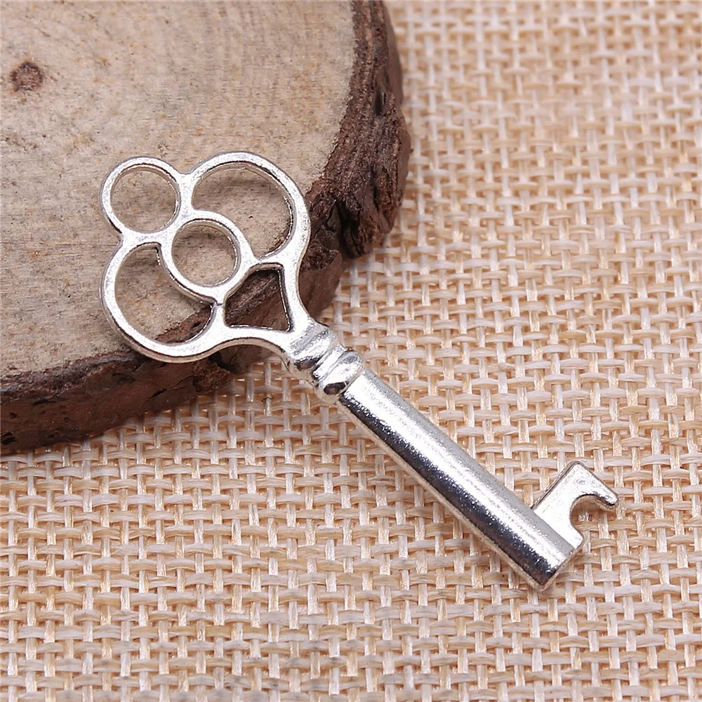 

Wholesale 100pcs/bag 43x17mm Key Charms Wholesale Antique Silver Color Pendant Charms Wholesale Jewelry Findings