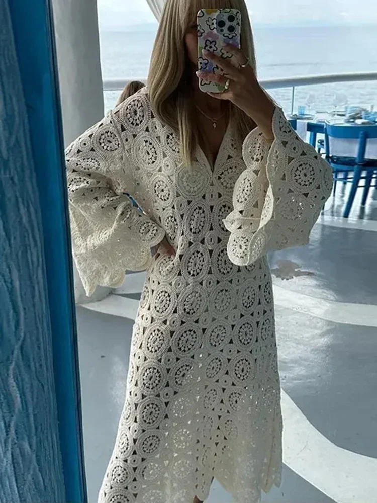 

Trending in 2025: Women's Sexy Solid Tone Midi Dress Boasting Hollow Out Details and Intricate Lace Up V Neck Long Sleeves