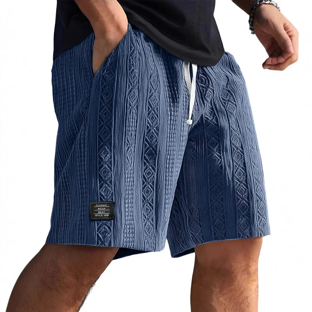 Pantaloni corti da uomo comodi e casual Texture Logo della moda Pantaloncini da spiaggia per uso quotidiano Pantaloncini estivi per il tempo libero da uomo con fantasia elegante