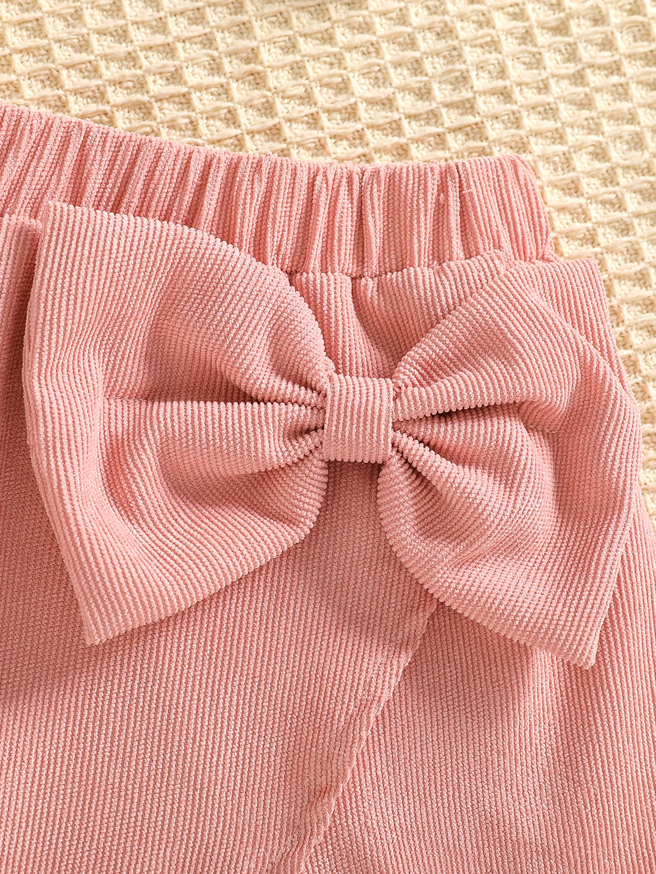Conjunto de dos piezas de moda para niña con cuello colgante, Top sin mangas y falda corta con decoración de lazo