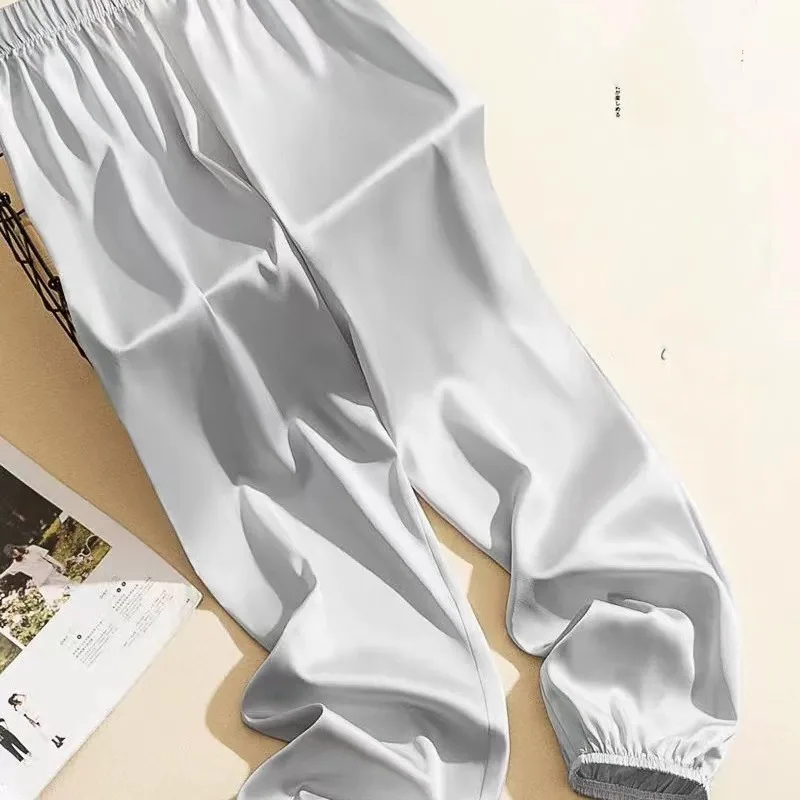 Minimalist Summer Solid Men's Wear Elastic Waist Ice Silk Fabric Pockets Fashion Versatile Loose Bound Feet Straight Pants