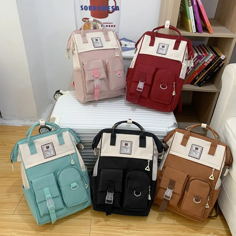 Mulheres náilon mochila doce cor à prova dwaterproof água sacos de escola para adolescentes meninas meninos mochila feminina casual estilo simples