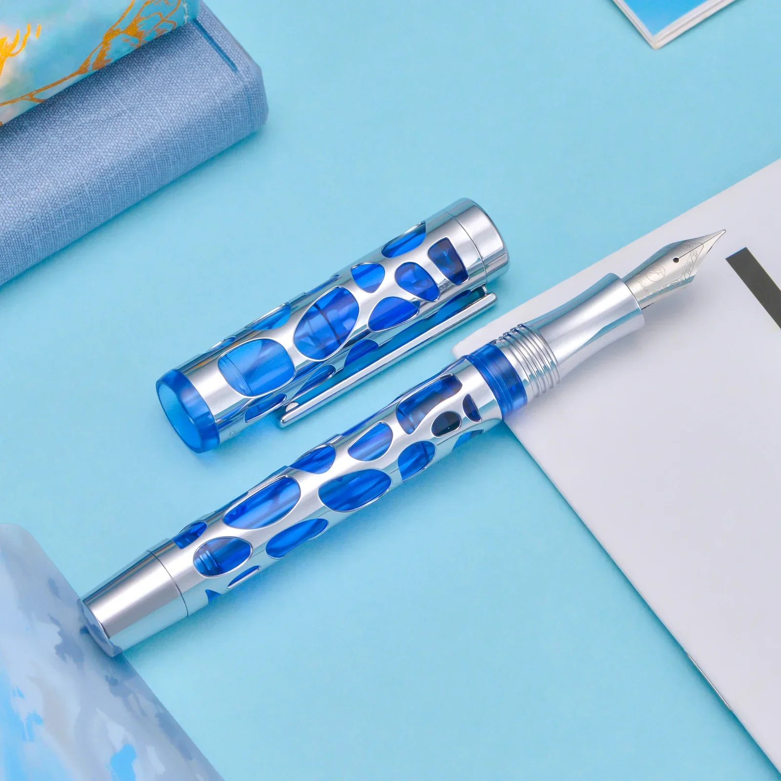 

Asvine V169 Vacuum Filling Fountain Pen Blue-Silver Transparent Acrylic Hollow Carved EF/F/M Writing Pen Gift