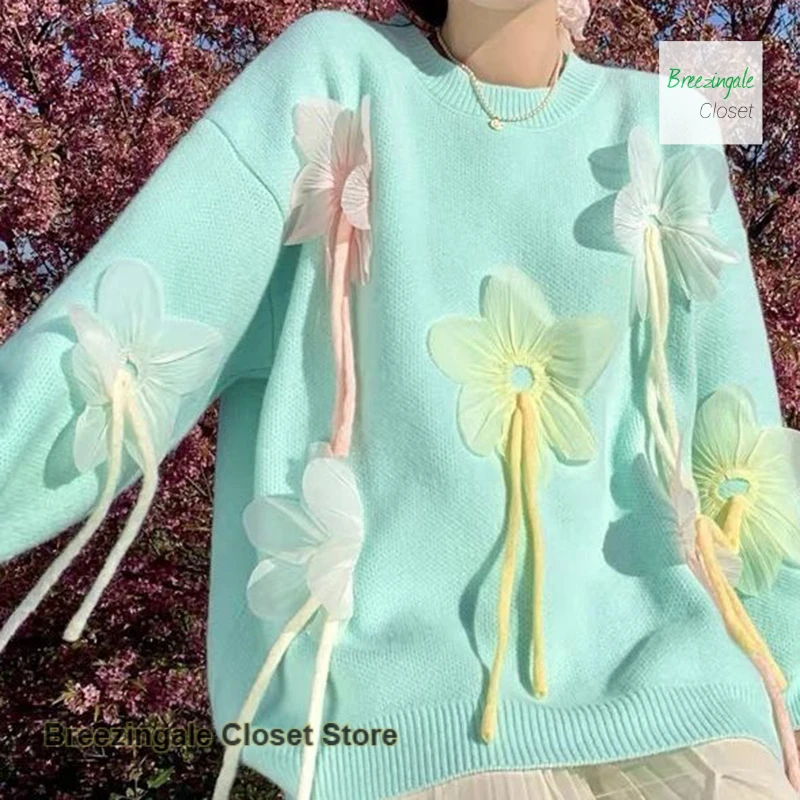 

Korean style sweet girl applique sweater female autumn and winter new loose sweater flowers three-dimensional casual Joker top.