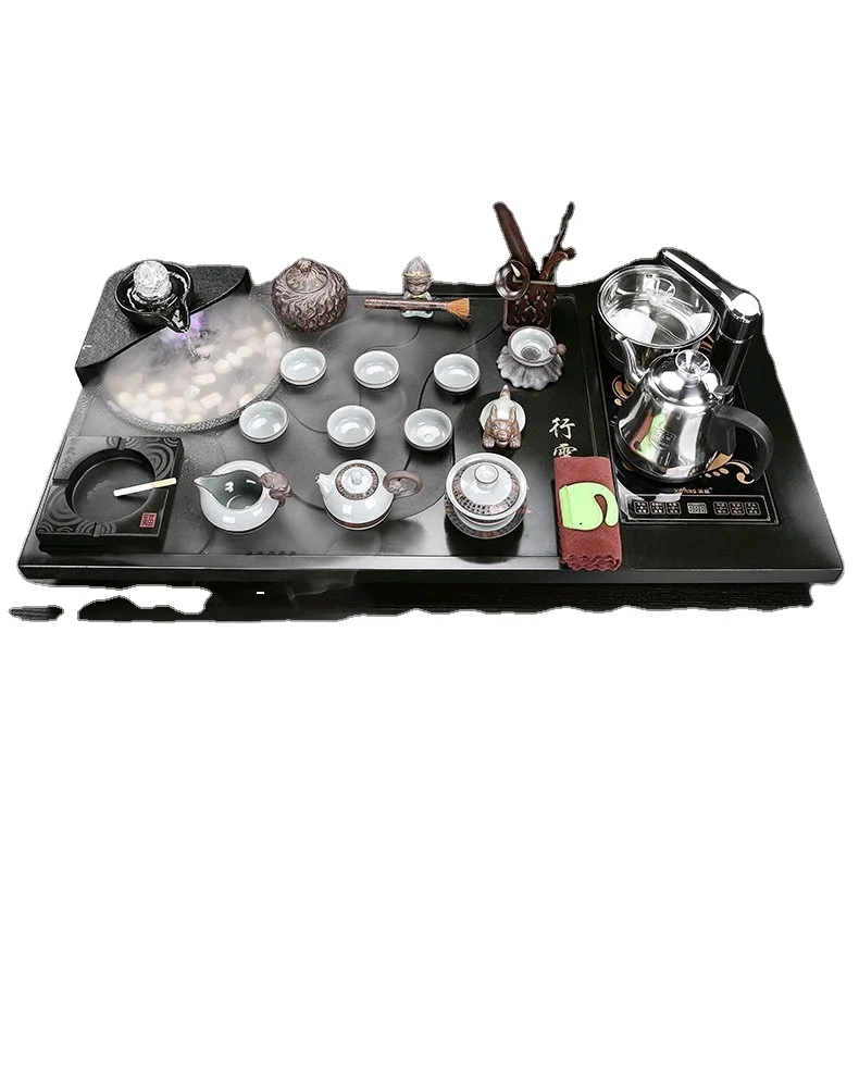 

Chinese High-grade Water Atomized Wujinshi Tea Tray Kung Fu XingYunLiuShui Large Table Automatic Tea Set