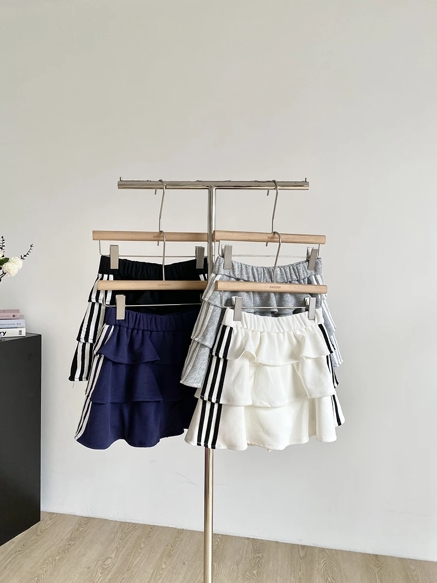 

Лето 2023, новая корейская простая спортивная юбка с эластичной резинкой на талии, свободная повседневная юбка, женский тренд