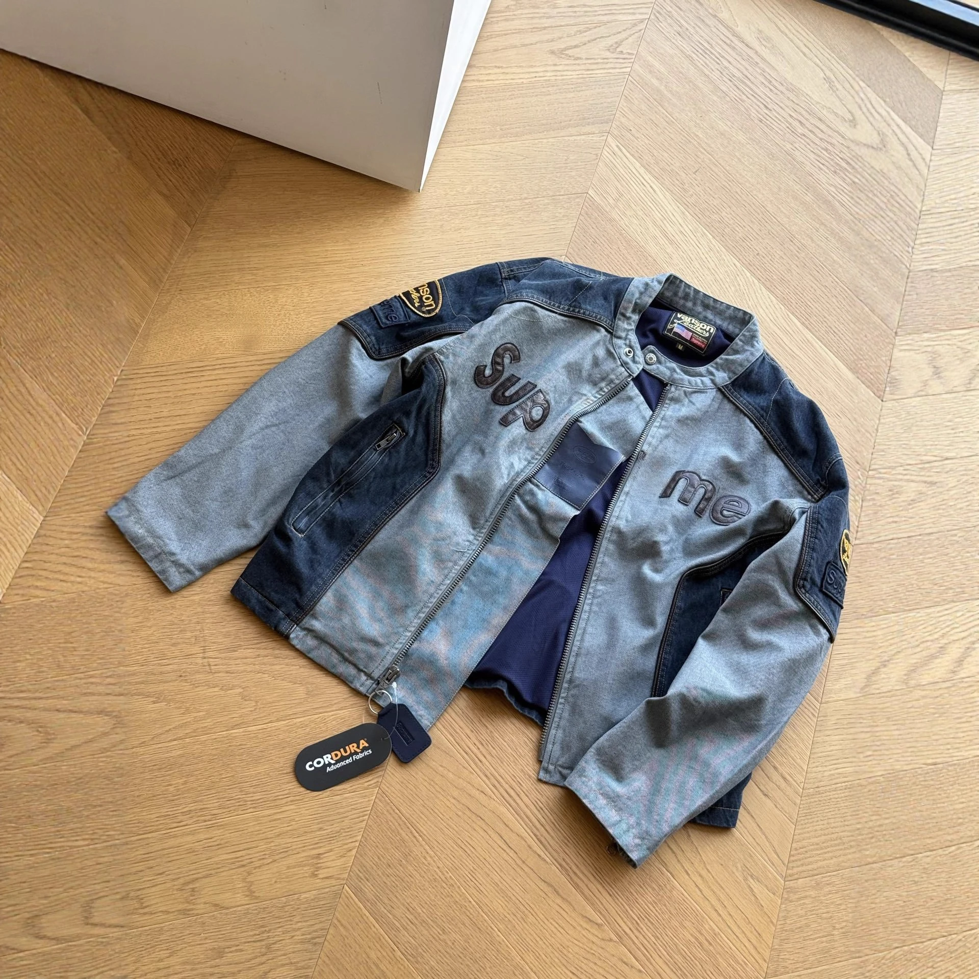 Chaqueta de empalme con cremallera y logotipo de cuero conjunto de otoño e invierno de marca de moda retro americana para hombres y mujeres