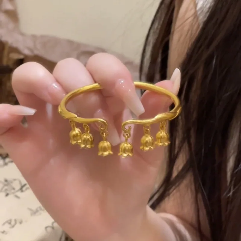 

Women's 24K Gold Lily of the Valley Open Bangle, AU999 | Engraved "Purity" with hidden dewdrop motifs on leaves.