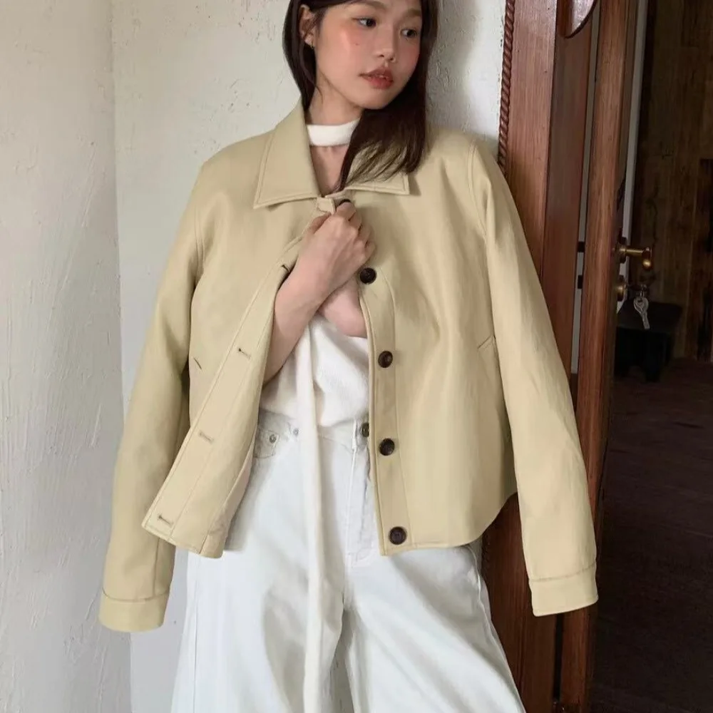 เสื้อแจ็คเก็ตหนังผู้หญิง สไตล์ชิค ลำลอง คอปกหลวม วินเทจ อเนกประสงค์ สำหรับฤดูใบไม้ร่วงและฤดูหนาว ดีไซน์เรียบง่าย เหมาะสำหรับใส่ไปทำงาน แขนยาว