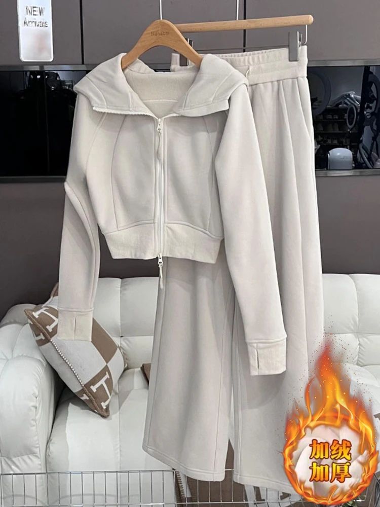 

Женский зимний новый дизайн 2025 года, толстый и теплый комплект из двух предметов в корейском стиле, темно-синее пальто с воротником, широкие брюки с завязками