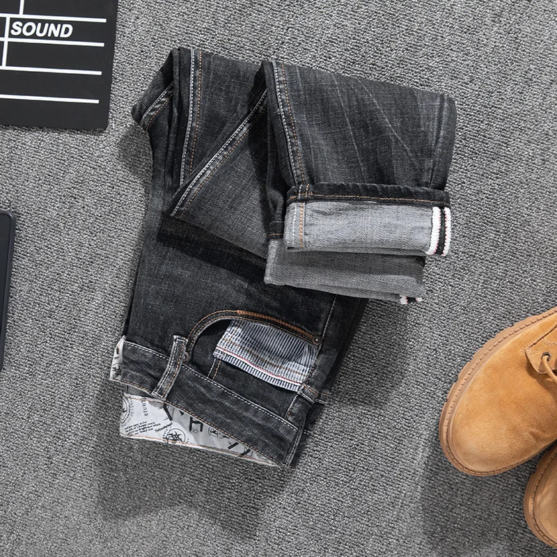 سراويل جينز عصرية للشارع الكوري للرجال بقصة ضيقة ومستقيمة ومزودة بنطال جينز ثقيل الوزن مغسول عالي الجودة