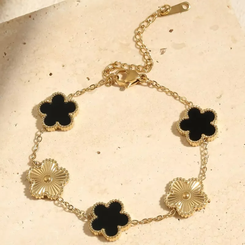 Adjustable stainless steel reversible bracelet with five-petal flower, fashion wristband & women’s fashion jewelry.