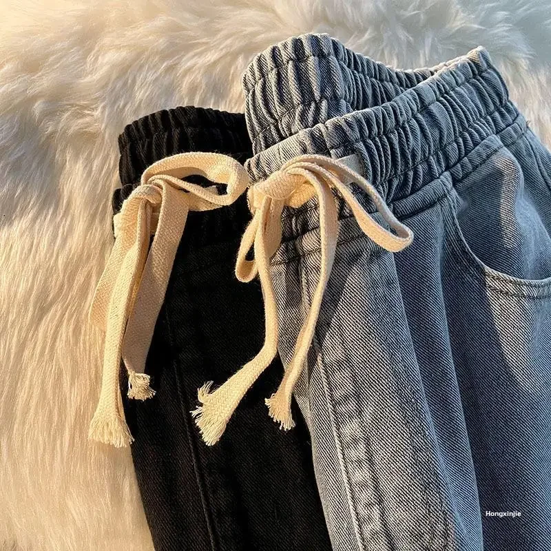 Jeans alla moda a gamba dritta larghi elasticizzati in vita stile sottile estivo da donna 2023 nuovi pantaloni a gamba larga con coulisse primavera autunno