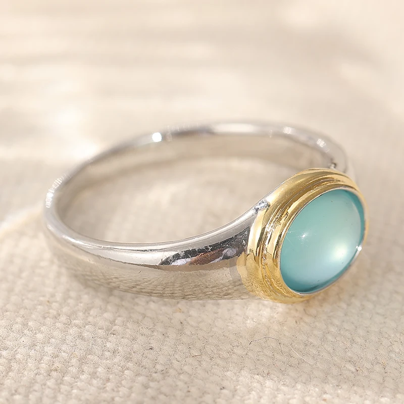 Eleganter Damenring mit eingelegtem meerblauen Stein, trendiger zweifarbiger Schmuck für den Alltag, Party-Schmuck, Jubiläumsgeschenk – Detail 2