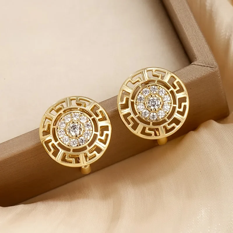 Huitan Trendige hohle runde Creolen für Damen, mit glänzendem Zirkonia besetzt, goldfarben, moderner modischer Damenschmuck