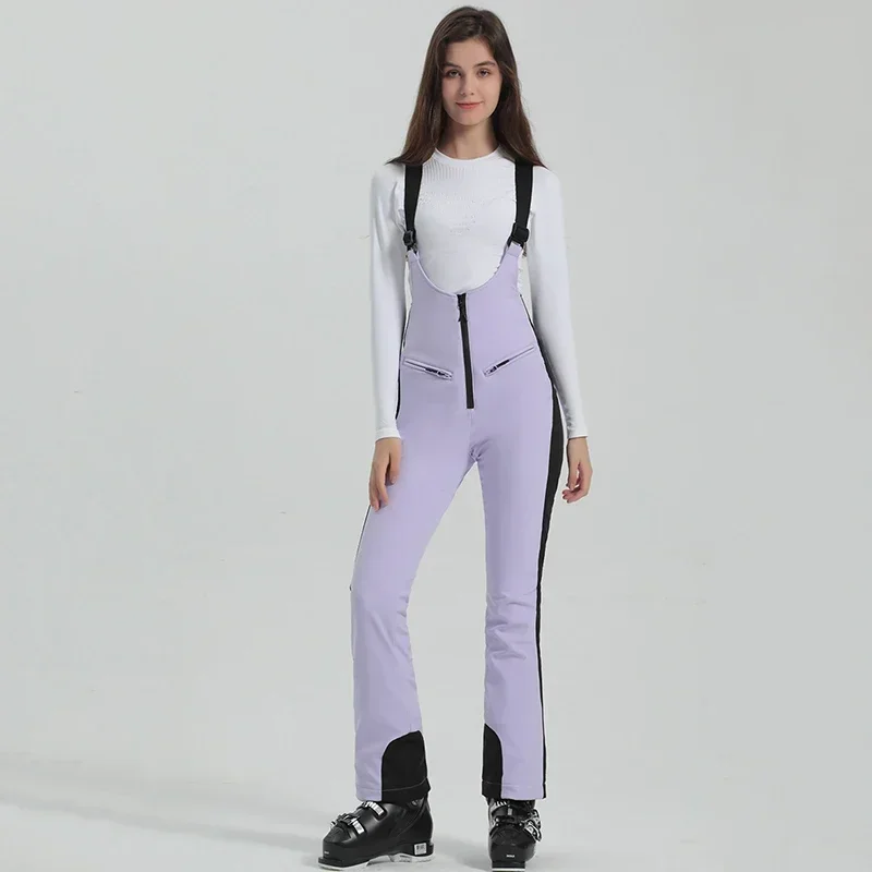 جمبسوت ثلج عالي المرونة للنساء ، بنطلون تزلج ، بنطلون مقاوم للرياح ، رياضة تزلج على الجليد في الهواء الطلق ، وزرة نسائية ، جبلية ، شتاء ، توي