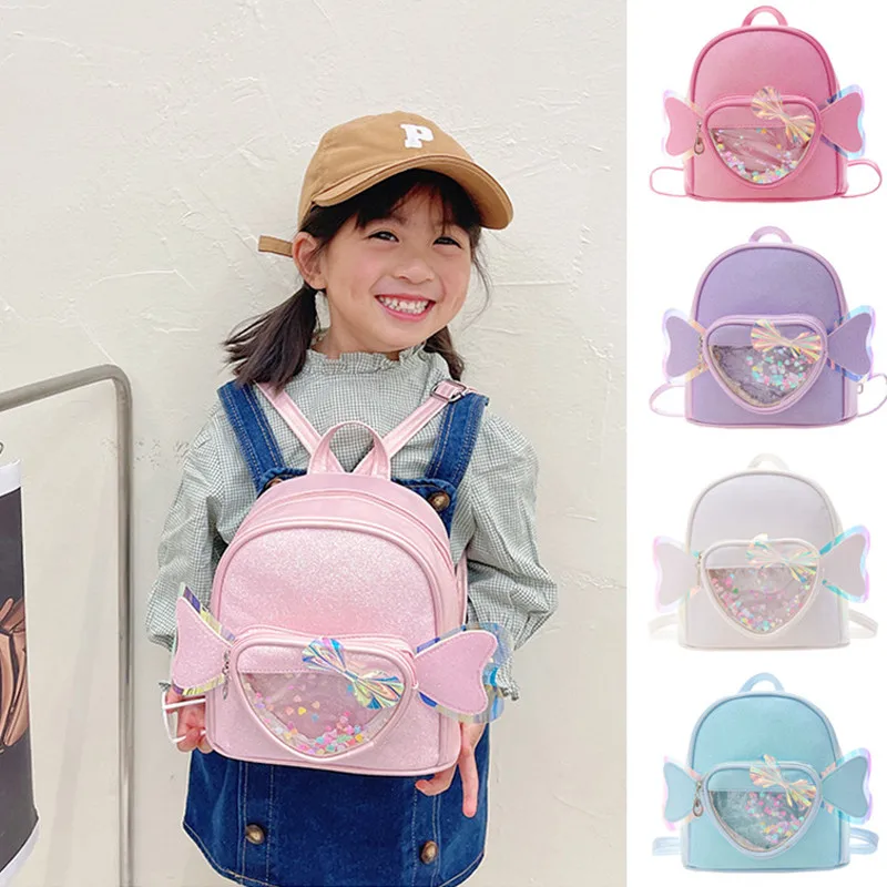 

New Cute Angel Wing PU Backpack Girl Heart Shape Bowknot Schoolbag Transparent Kindergarten Bag Trend All-match Backpack BG132